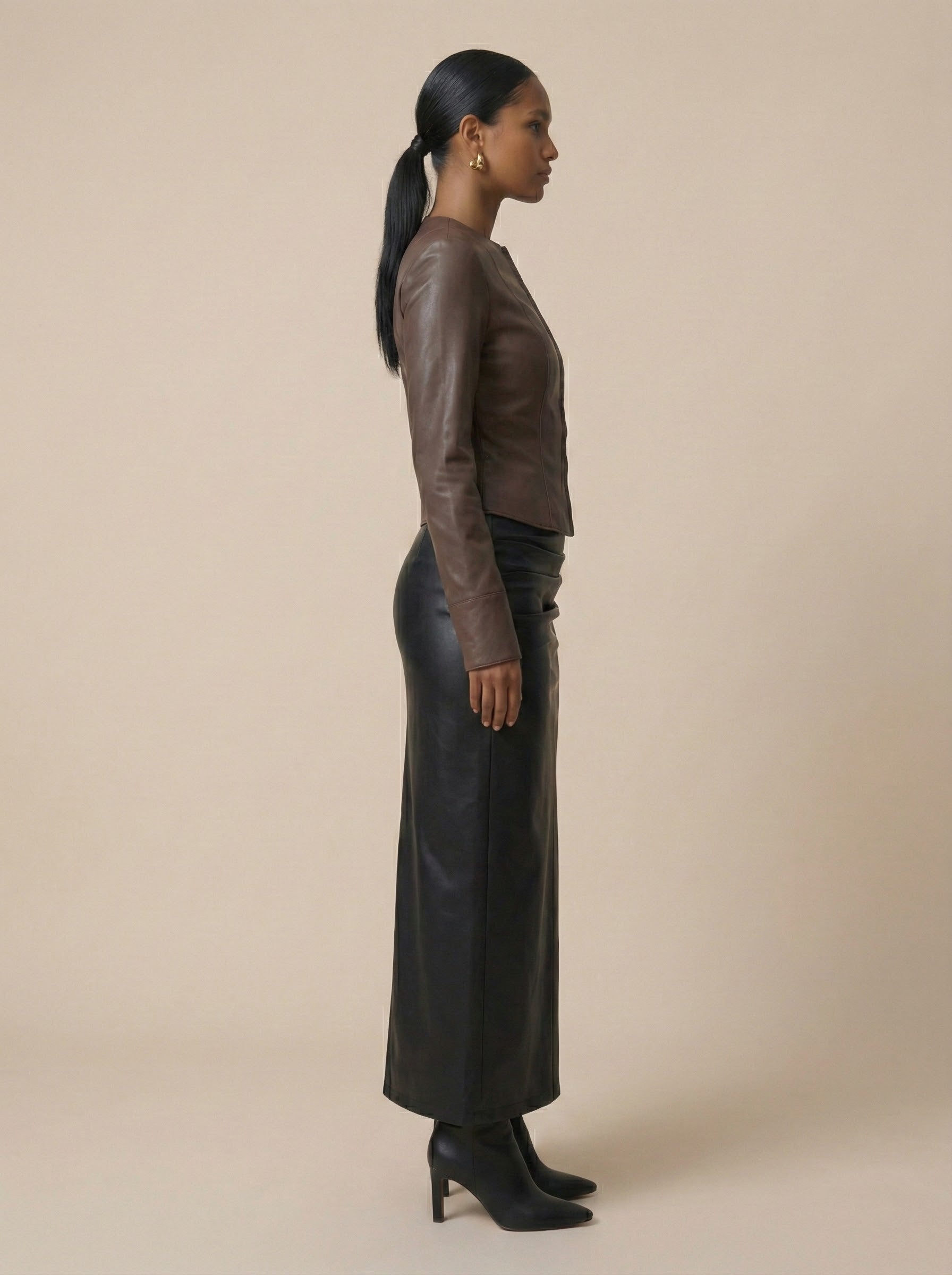 Structured elegance Faux leather top